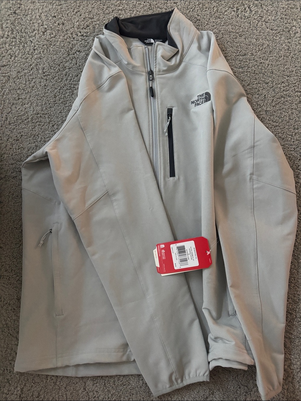 The North Face Men’s Light Gray Softshell Jacket with Chest Zip Pocket